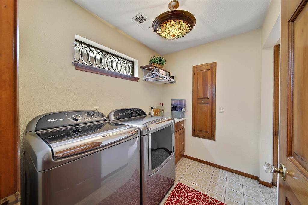 It does not get any more convenient to have your laundry room directly outside your bedroom! Built in ironing board is very useful and a nice charming feature!