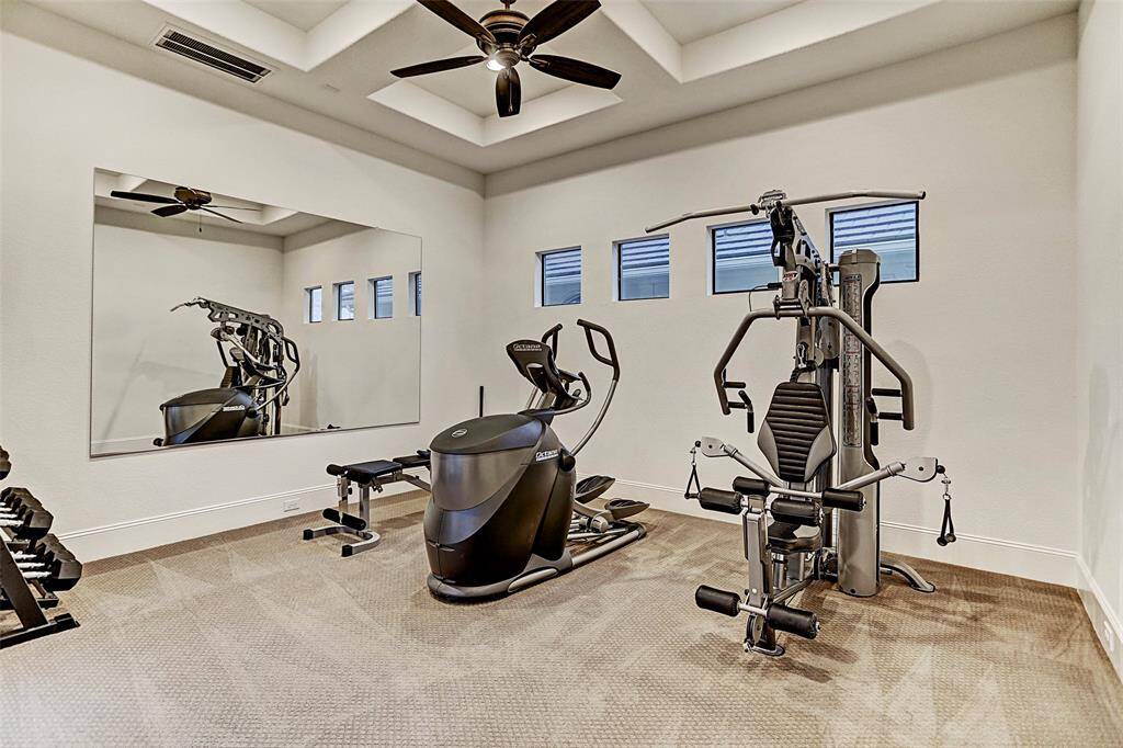 Extra Room | This extra room off the master hallway is currently being used as an exercise room. There are endless possibilities for this room- make it a third bedroom down, an exercise room or a study!
