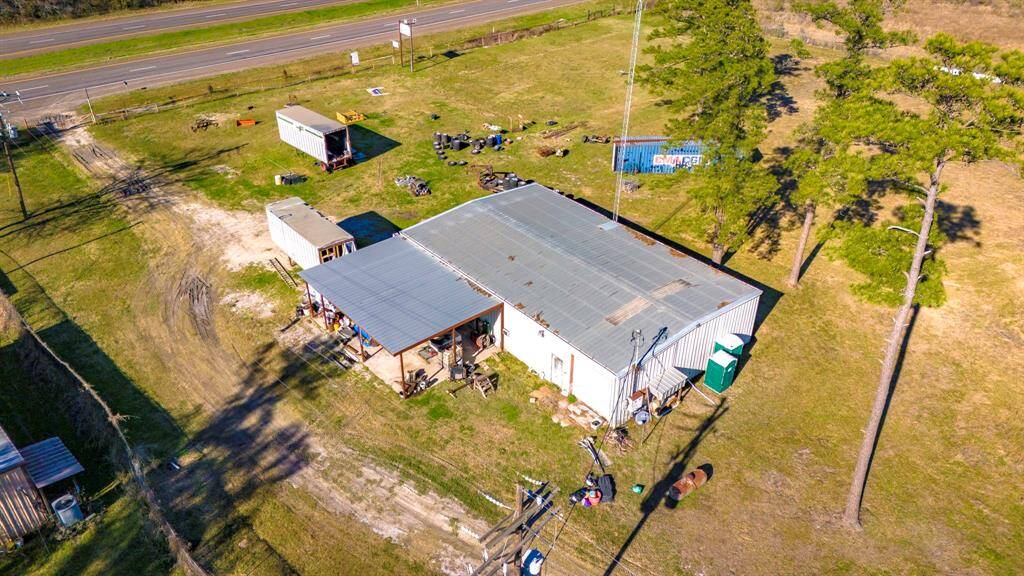 Aerial view of the prpfessional garage on the HWY with highway access