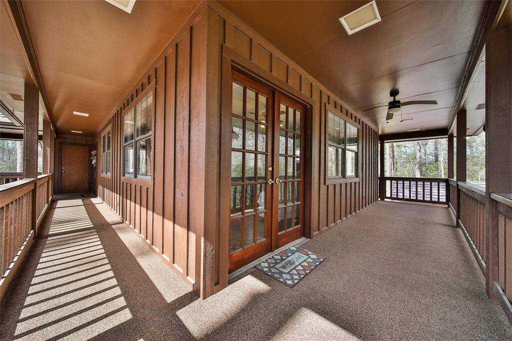 Wrap around porch for the guest quarters! Add a couple rocking chairs and a table and you are all set!