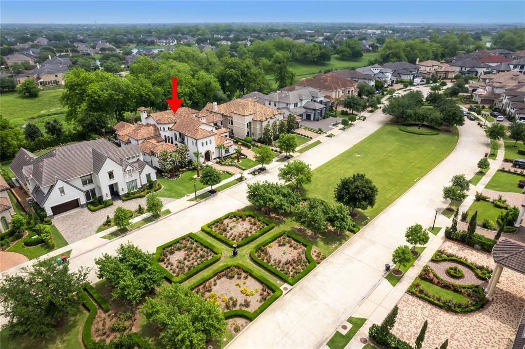 35 Enclave Manor is located in a Private Gated Enclave with an English Garden.