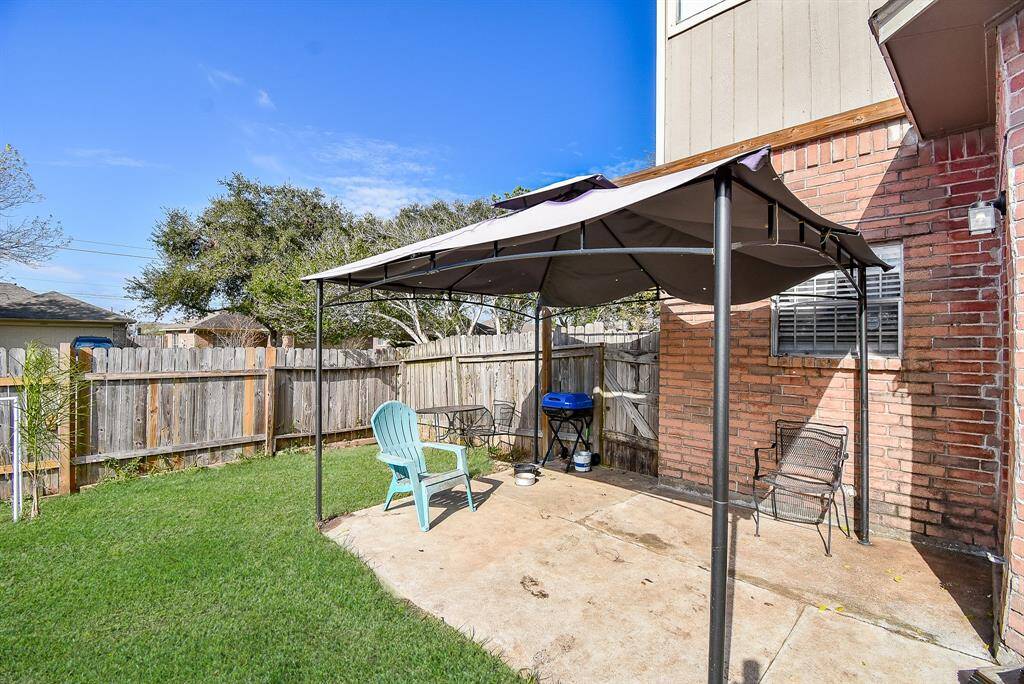 There's just enough sun and just enough shade on the covered patio/backyard to please everyone.