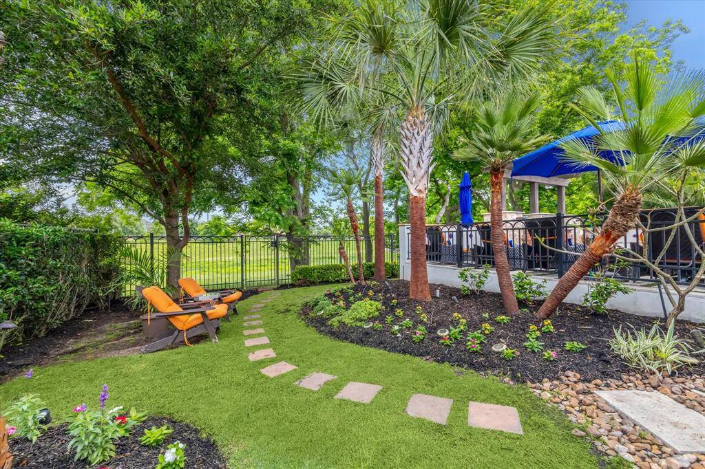 Plenty of grassy yard for the kids and pets to play.