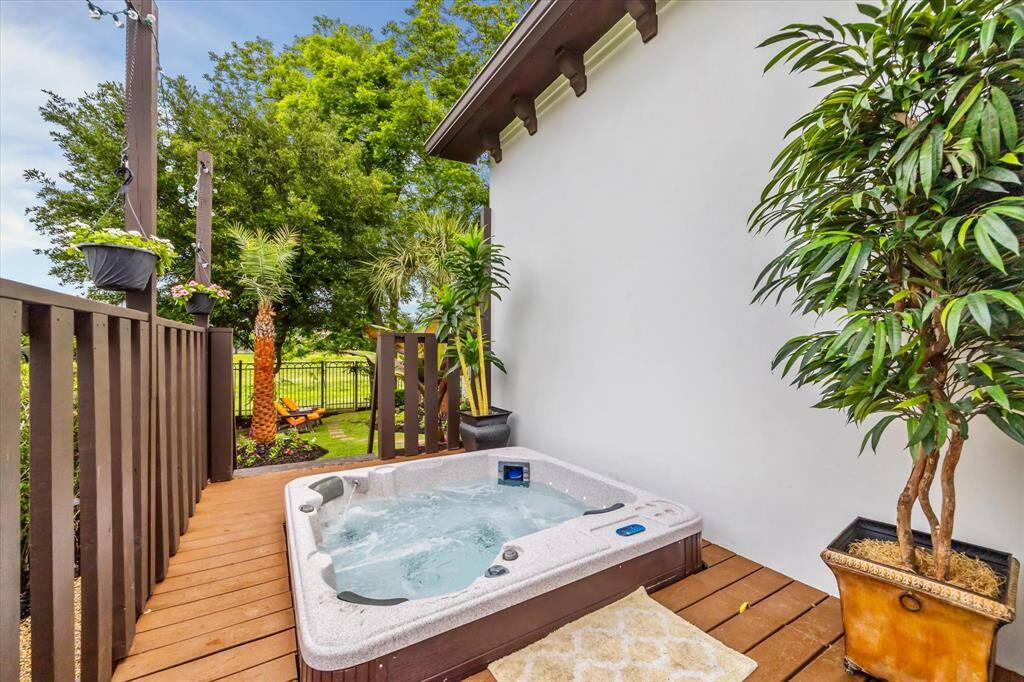 Relax at the end of a busy day in your Private hot tub with outdoor lighting for ambiance.