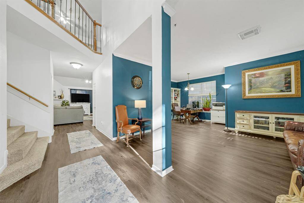 Entry with a view of the formal Living Room and Formal Dining