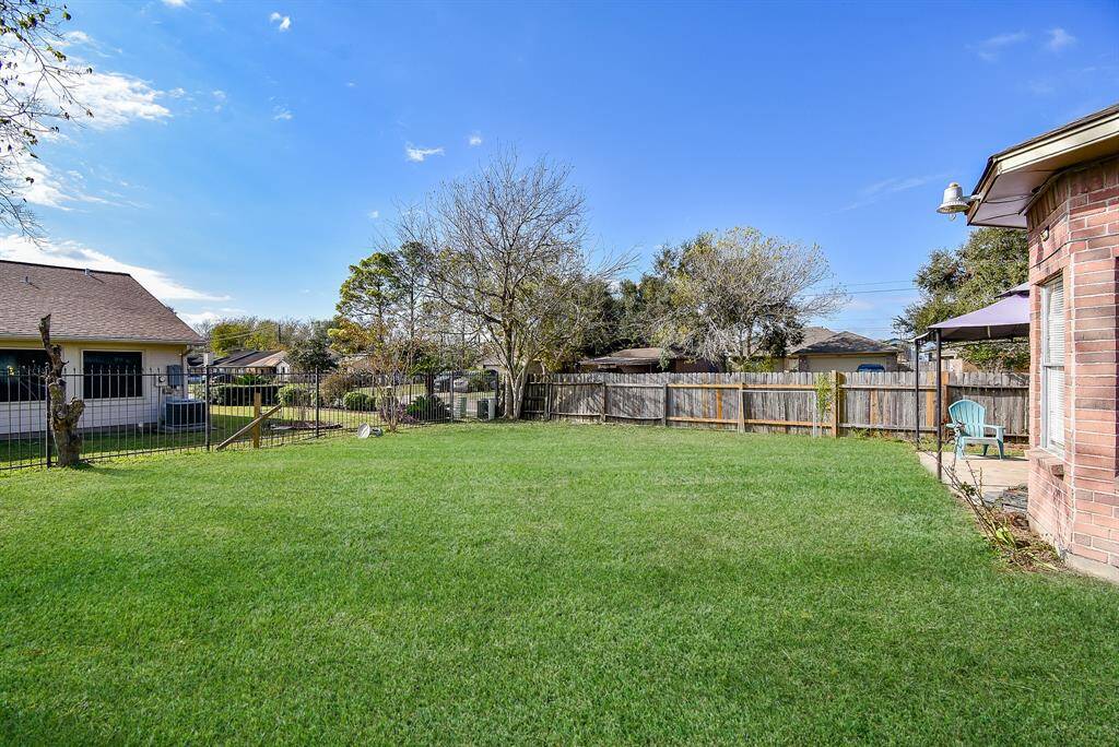 The entire back property is fenced in for added privacy and security.