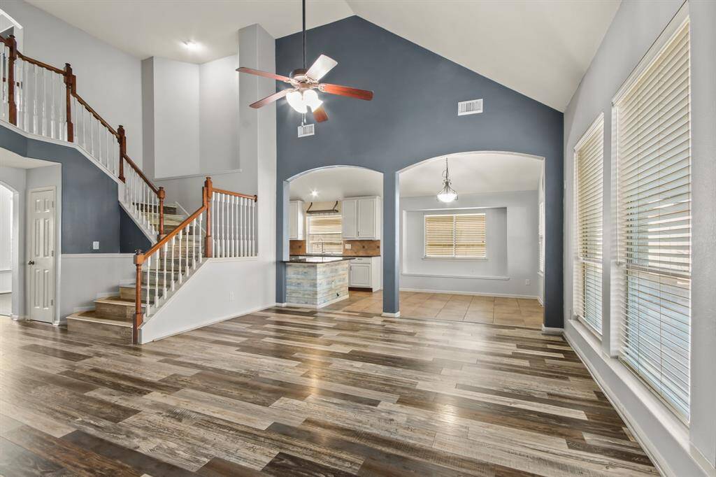 Family living area with tall ceilings