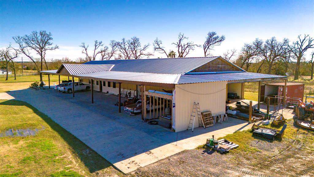 This is a new enclosed bay being built on the corner or the barndo and right outside a connected garages that hold about 13 cars. (office and restroom enclosed).