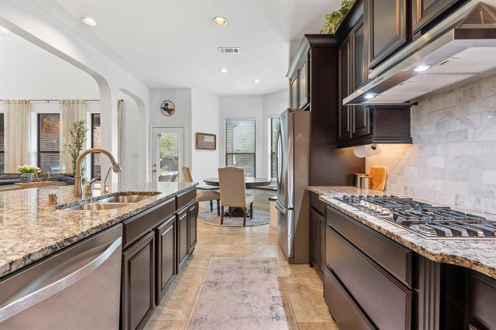 Pot and pan drawers and cabinets with slide outs make this kitchen function like a dream.