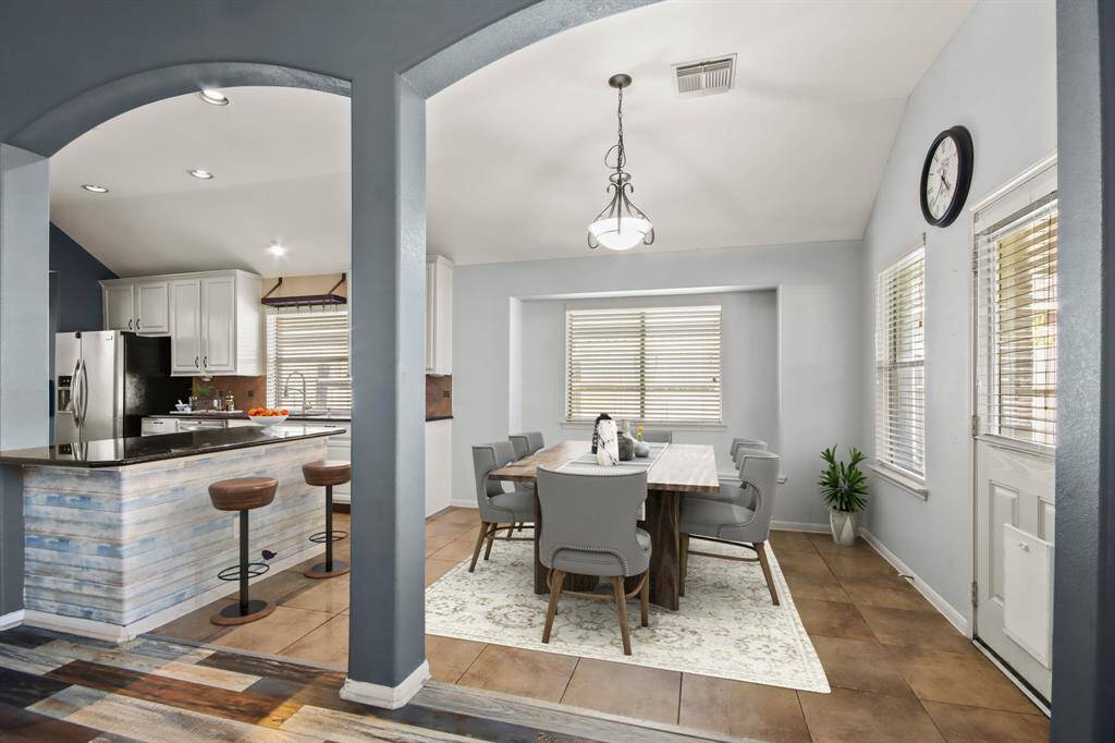 Morning/ Dining area, staged with furniture photo