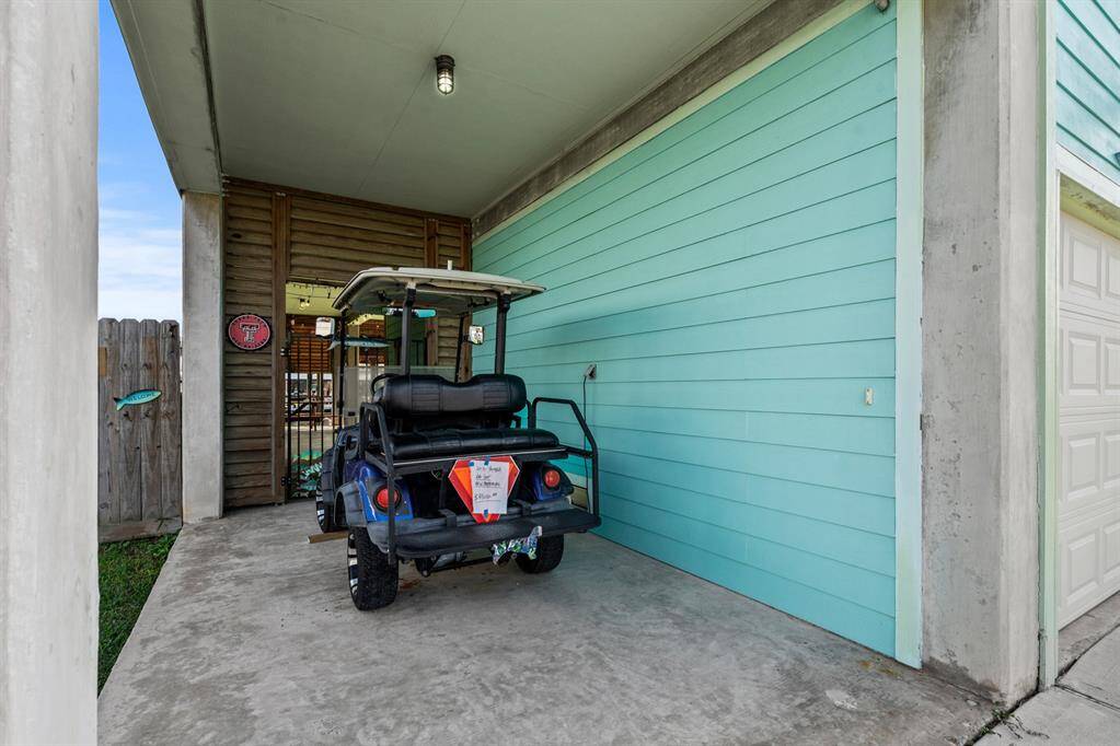 Covered carport for golf cart.  A golf cart is the mode of transportation in Bayou Vista. You will enjoy sunrises, sunsets, estate sales, dinner or lunch.  Stop at EZ Mart for eggs or some really great BBQ