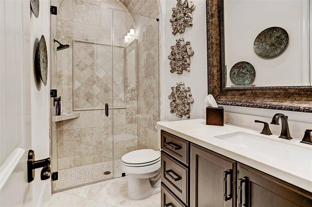 Guest Casita En Suite Bathroom | Luxurious en suite bathroom with Tiled Shower and Bronze Fixtures