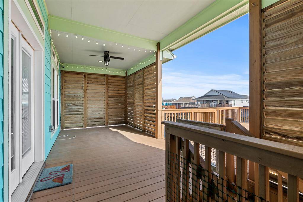 Wooden louvers offer shade and privacy.