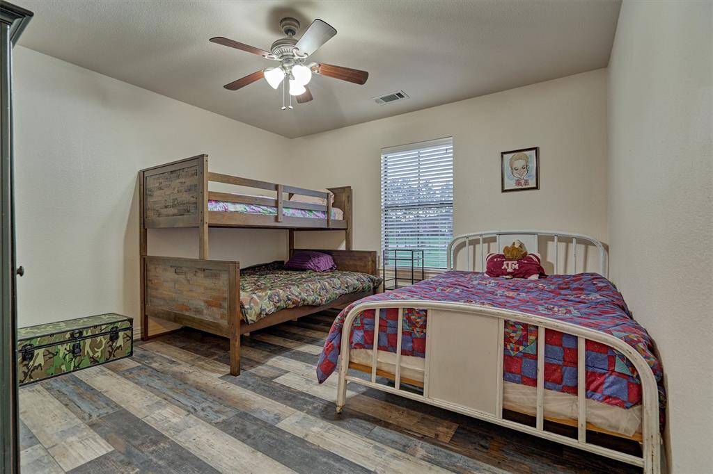 The fourth bedroom features a large walk in closet and window overlooking the front yard. This room has been virtually staged.