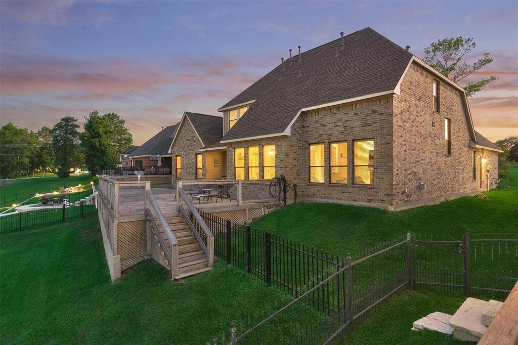 A recently added oversized wooden deck provides the perfect space for lounging, entertaining, and taking in the beautiful lake views.