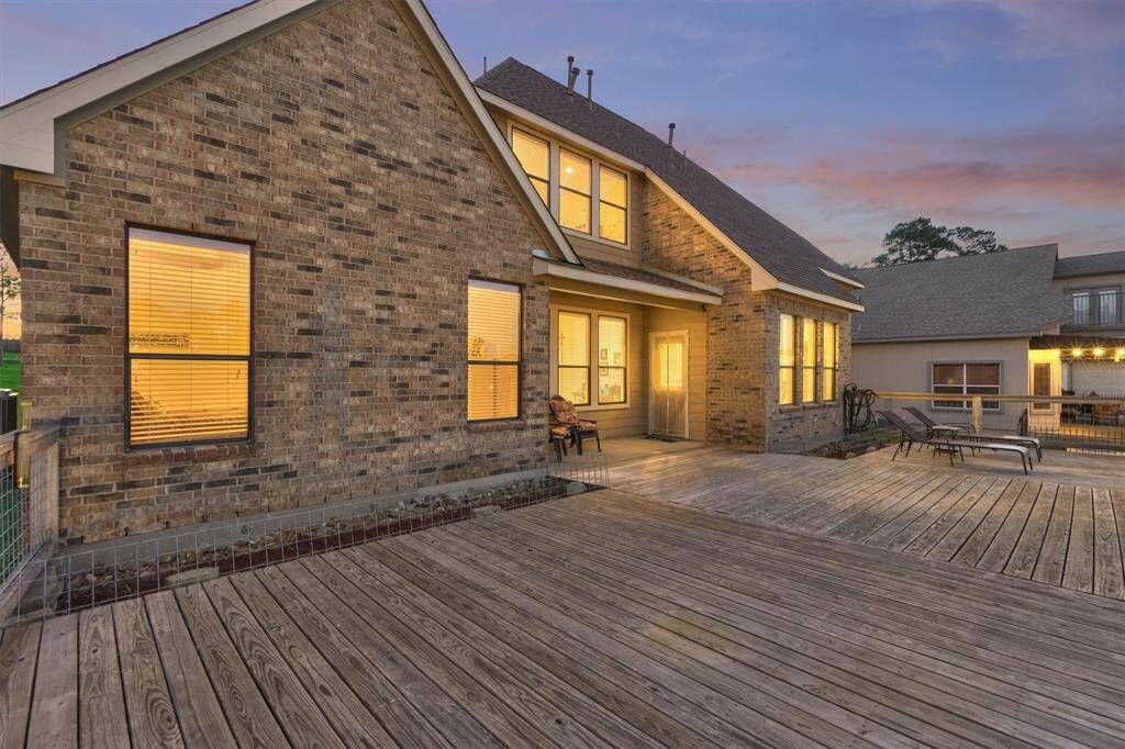 The deck offers ample space to accommodate multiple sitting, dining and lounging areas.