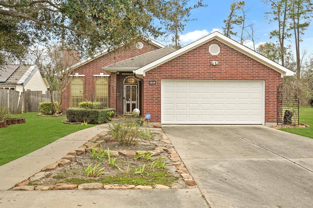 Charming brick home with a two-car garage, well-maintained front yard, and a welcoming entrance. Ideal for comfortable living in a pleasant neighborhood.