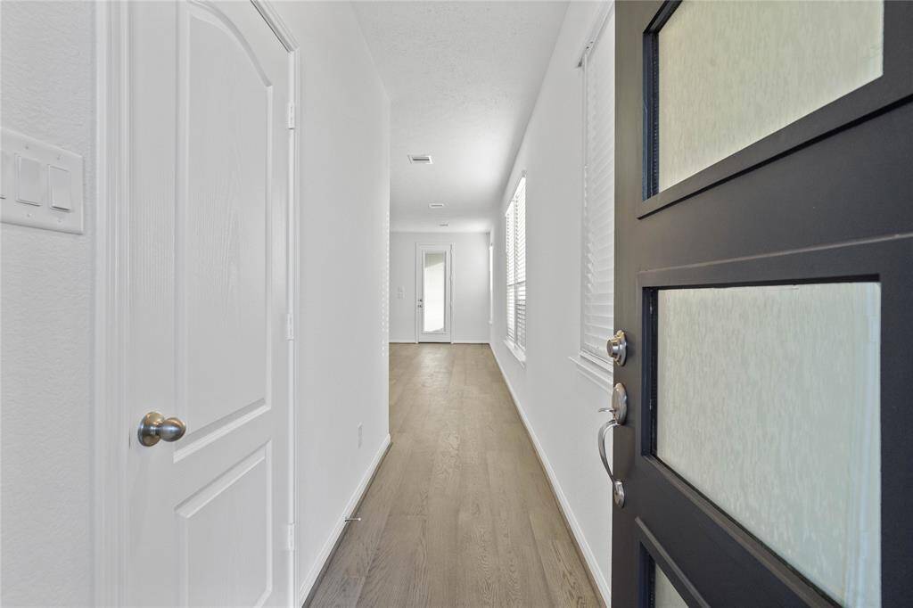 Welcome to 18307 Sessile Oak Drive. This home has 3 bedrooms, 2 bath, and 2 car attached garage. The entryway features beautiful engineered wood flooring and neutral bright paint.