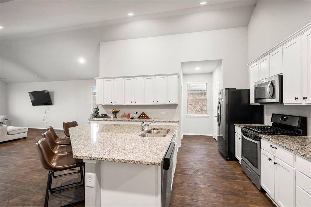 Kitchen open to the family room.