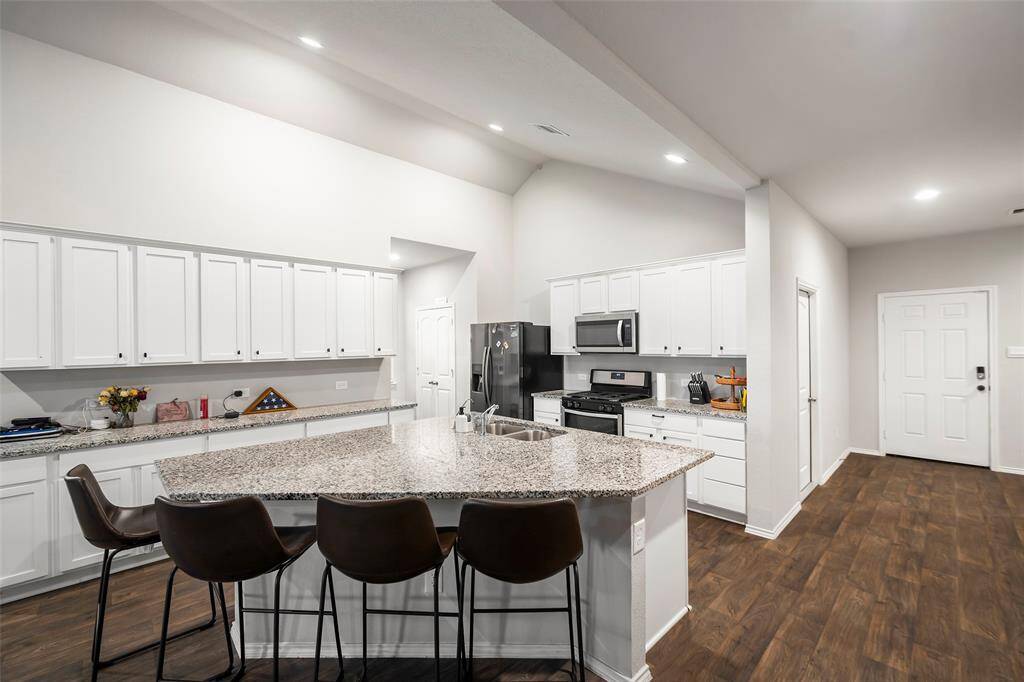 Love this big Island for everyone to gather. Lots of cabinets too!