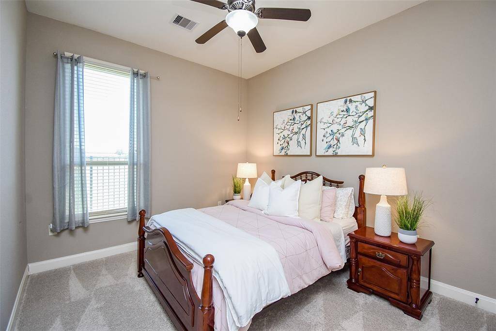 Third bedroom overlooks the beautiful community park.