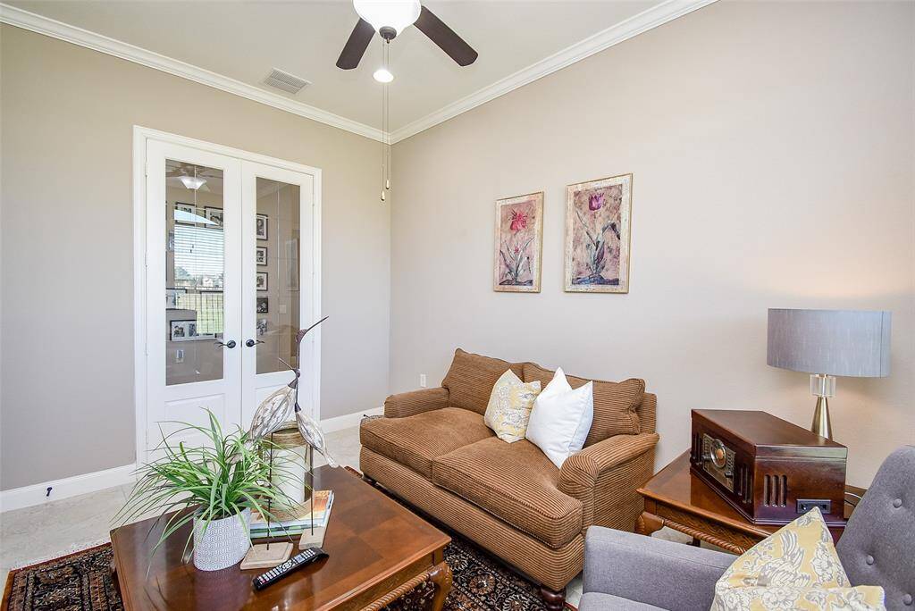 Alternate view of the Flex Room shows lovely french doors that provide privacy when needed for the space.
