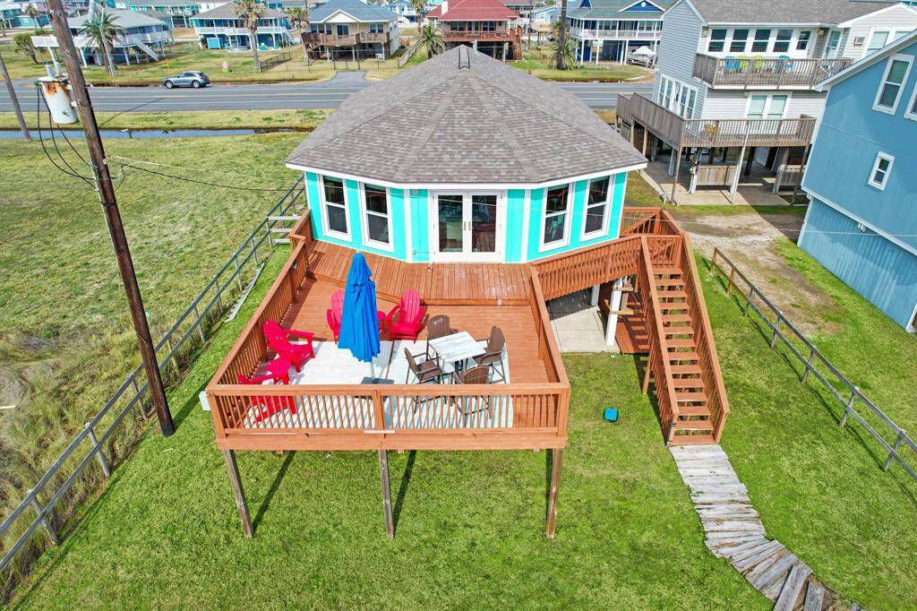 ENJOY THE GREAT OUTDOORS ON THE OVERSIZED DECK, PERFECT FOR GATHERINGS WITH  FRIENDS AND FAMILY!