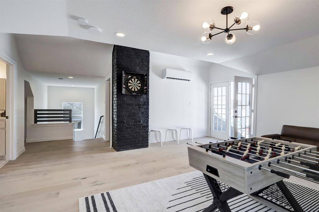 Entire suite on upper level which may be occupied by one tenant or shared as a game room/ common space amongst all tenants.