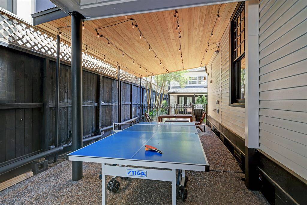 Carport is for unit 1 (lower level of main house) or back carriage house