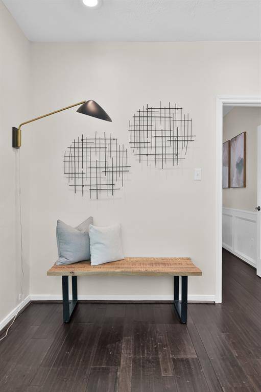 A thoughtfully designed nook that blends form and function—ideal as a stylish drop zone, reading corner, or artful moment in this curated estate.