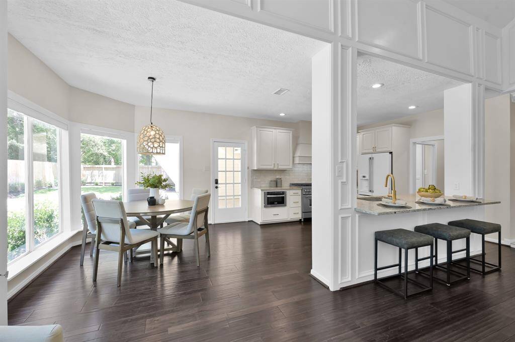 Designed for effortless flow, the open-concept kitchen and breakfast room offer the perfect backdrop for entertaining or relaxed everyday living—all bathed in natural light and elevated style.