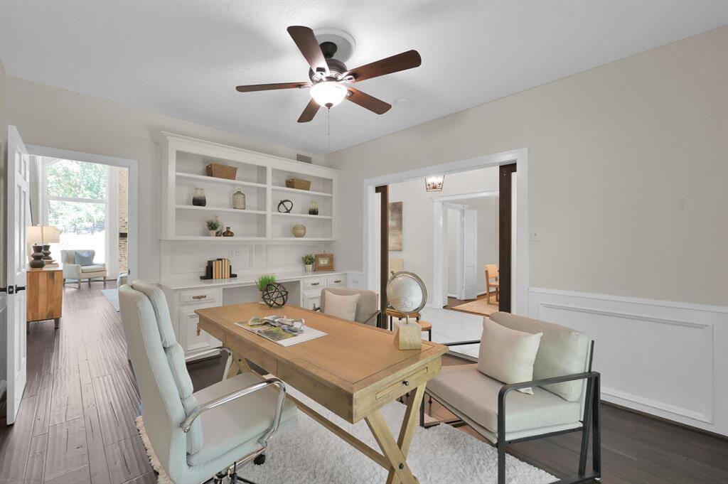 Custom built-ins add depth and distinction to this versatile flex space—ideal for a private study, library, or elegant lounge, all bathed in refined finishes.