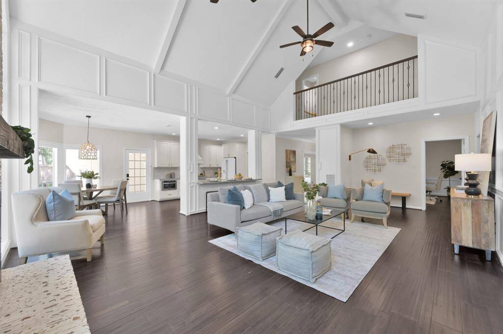 This expansive great room offers the perfect blend of refined elegance and everyday comfort—ideal for sophisticated entertaining or effortless family living, all beneath vaulted ceilings and a striking overlook.