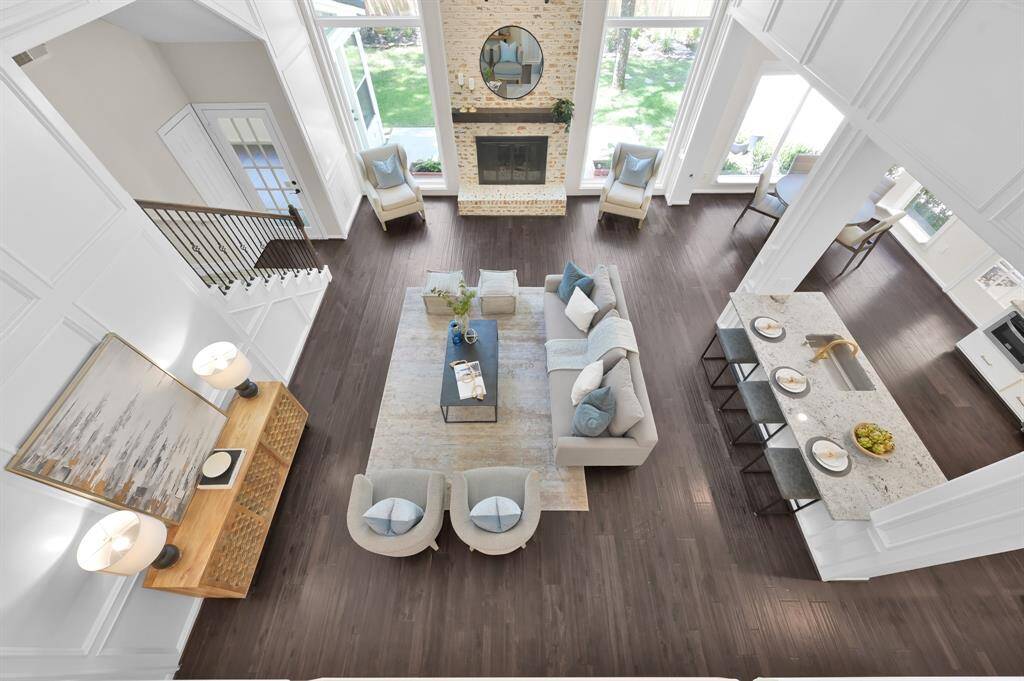 A breathtaking view from above captures the scale and elegance of the great room—where architectural drama, natural light, and effortless flow converge in perfect harmony.