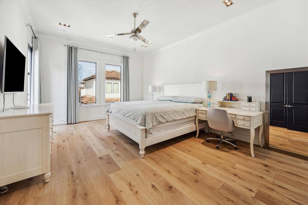 A spacious second bedroom sits off of the game room.  Large windows provide for a sunny retreat.