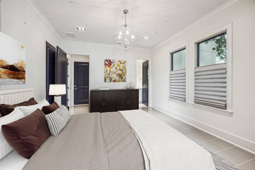 The third bedroom is located on the first floor. This photo has been virtually staged.