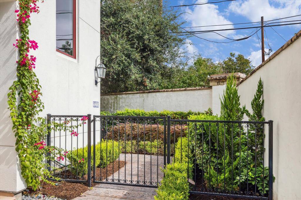 Your guests enter your property via a lovely walkway with pavers and proceed into a unique and beautifully landscaped private courtyard.