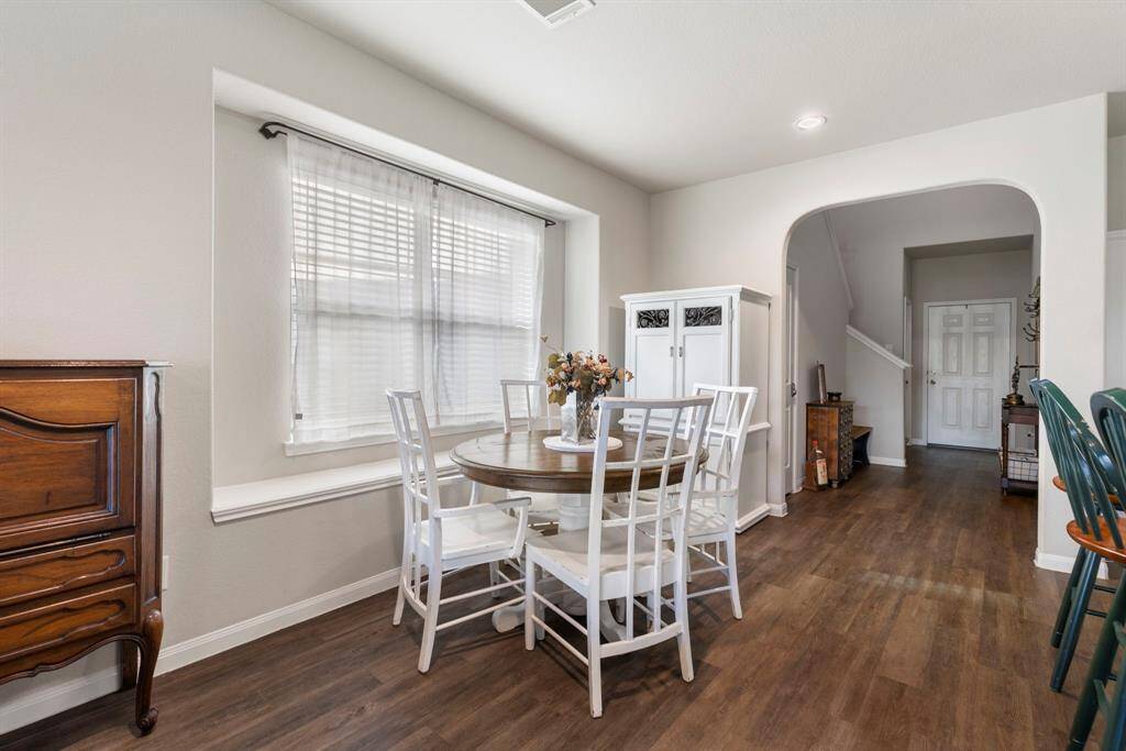 The shared space offers a large dining area, window seat and recessed overhead lighting.  The open concept is perfect for entertaining!