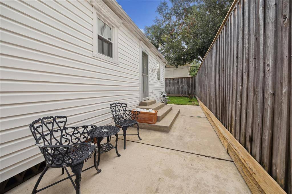 Nice Patio on the North Side of the  House!!! This door Leads Back into the Kitchen so PERFECT For Grilling on This Patio!!!!