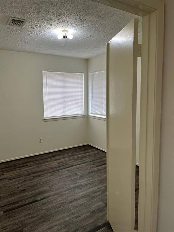 View of the fireplace/den from upstairs