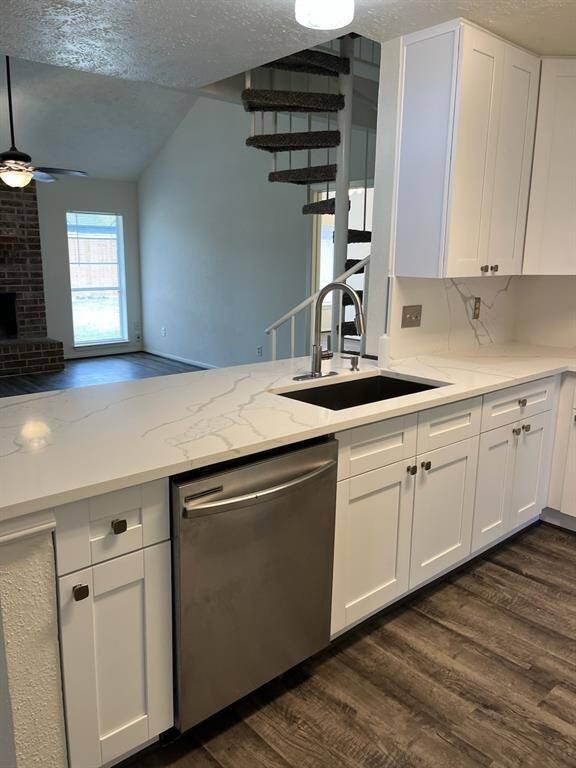 Kitchen view with new countertops and cabinets