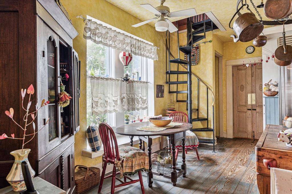 In the kitchen, you'll find a spiral staircase to the 3rd floor.