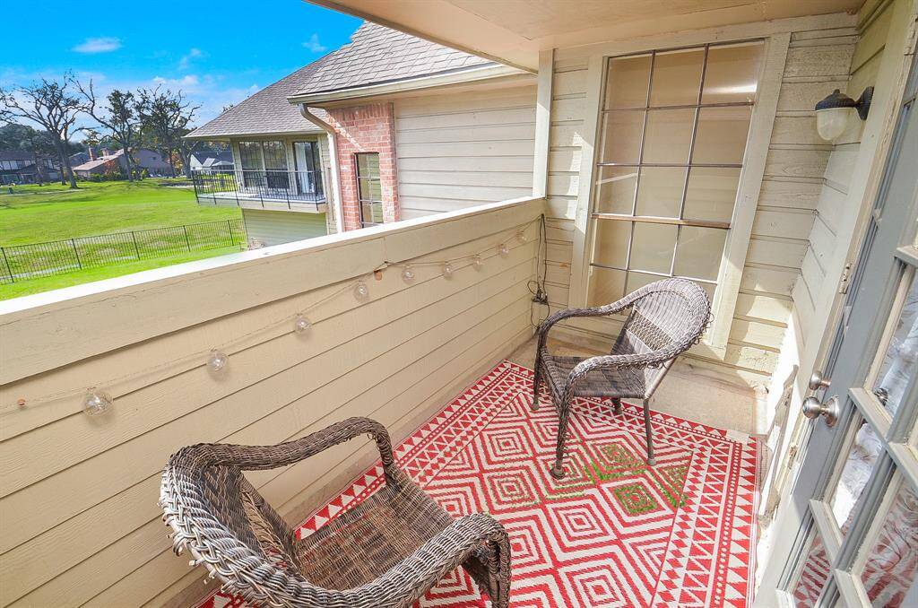 The private balcony attached to bedroom #1 upstairs overlooks the backyard and golfcourse.