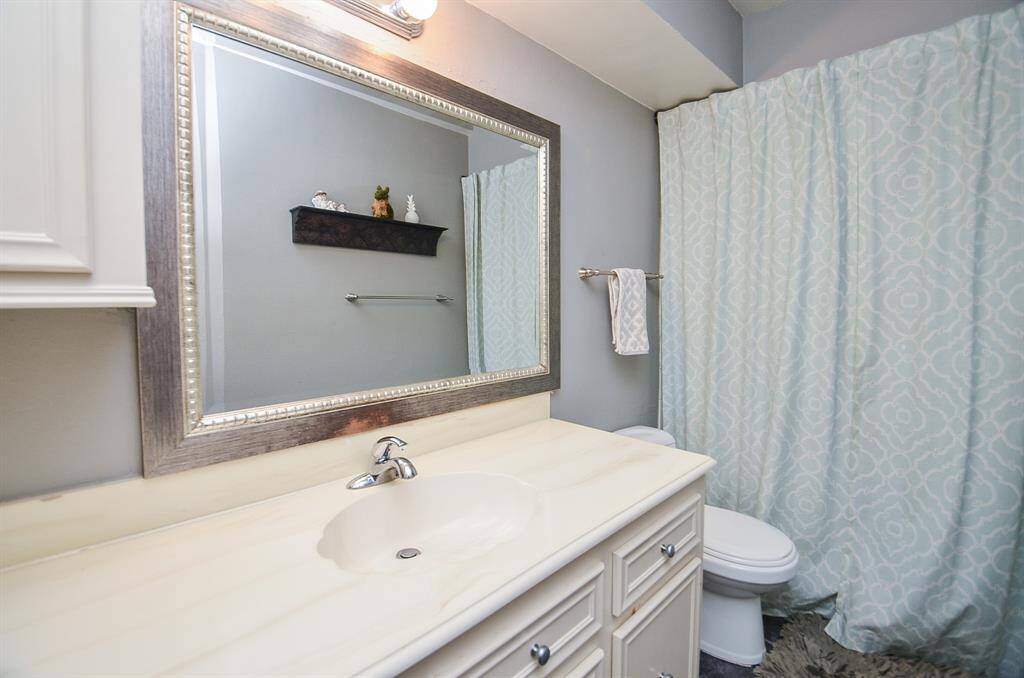 There are two bedrooms upstairs that share this full bathroom.