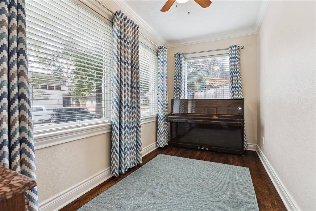 Just inside the front door on the left is this Versatile Cheery Room: Home Office, Play Room, Music Room (Piano can Stay with the Property.)