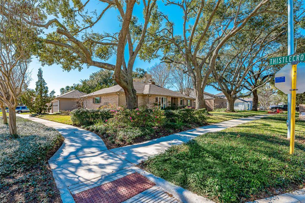 Corner lot view of home. All Sheetrock, floors, plumbing and electrical were changed out (shell only) in 2018. The roof was also replaced in 2018.