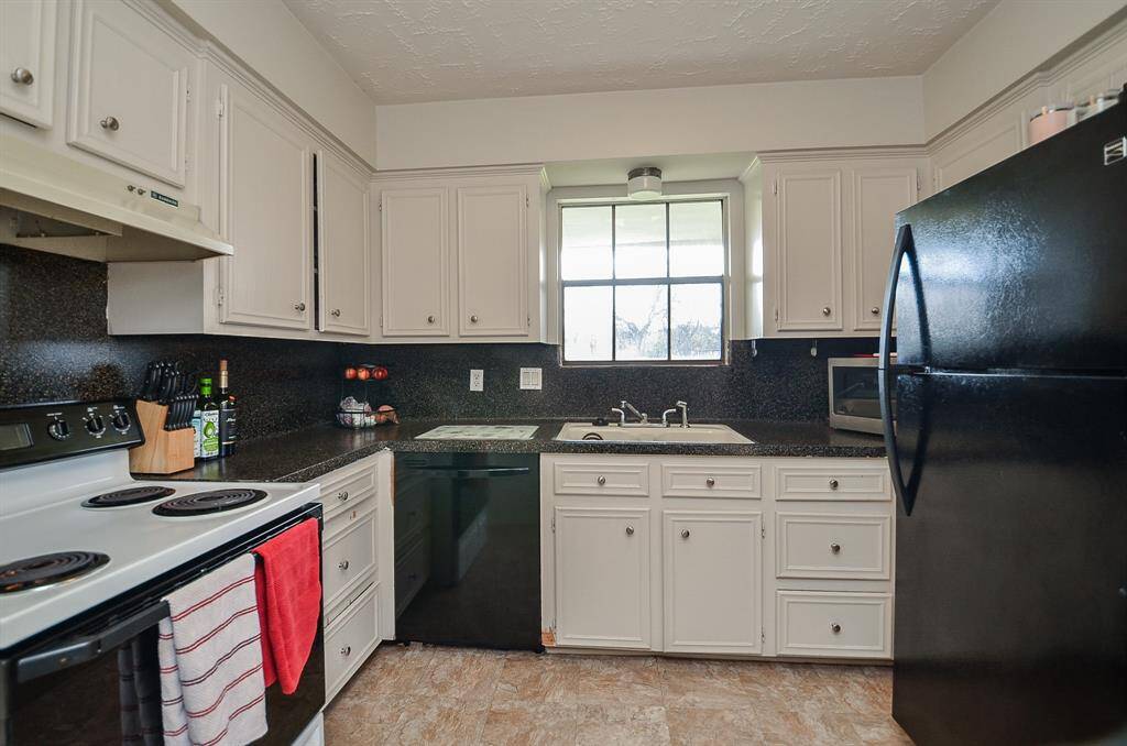 A full kitchen with full size appliances.