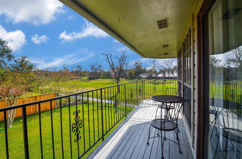 The view just outside the sliding glass doors to the balcony of the apartment.