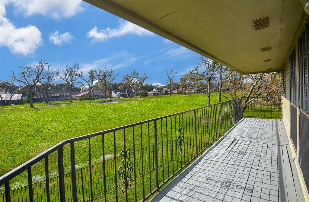 The balcony continues around the rear of the apartment and offers sweeping views.