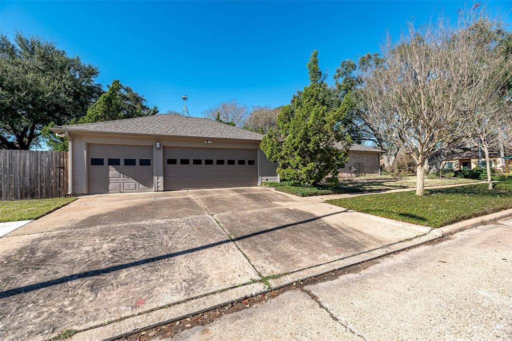 This home features a 3 car detached garage for extra storage and side entry on the corner lot.
